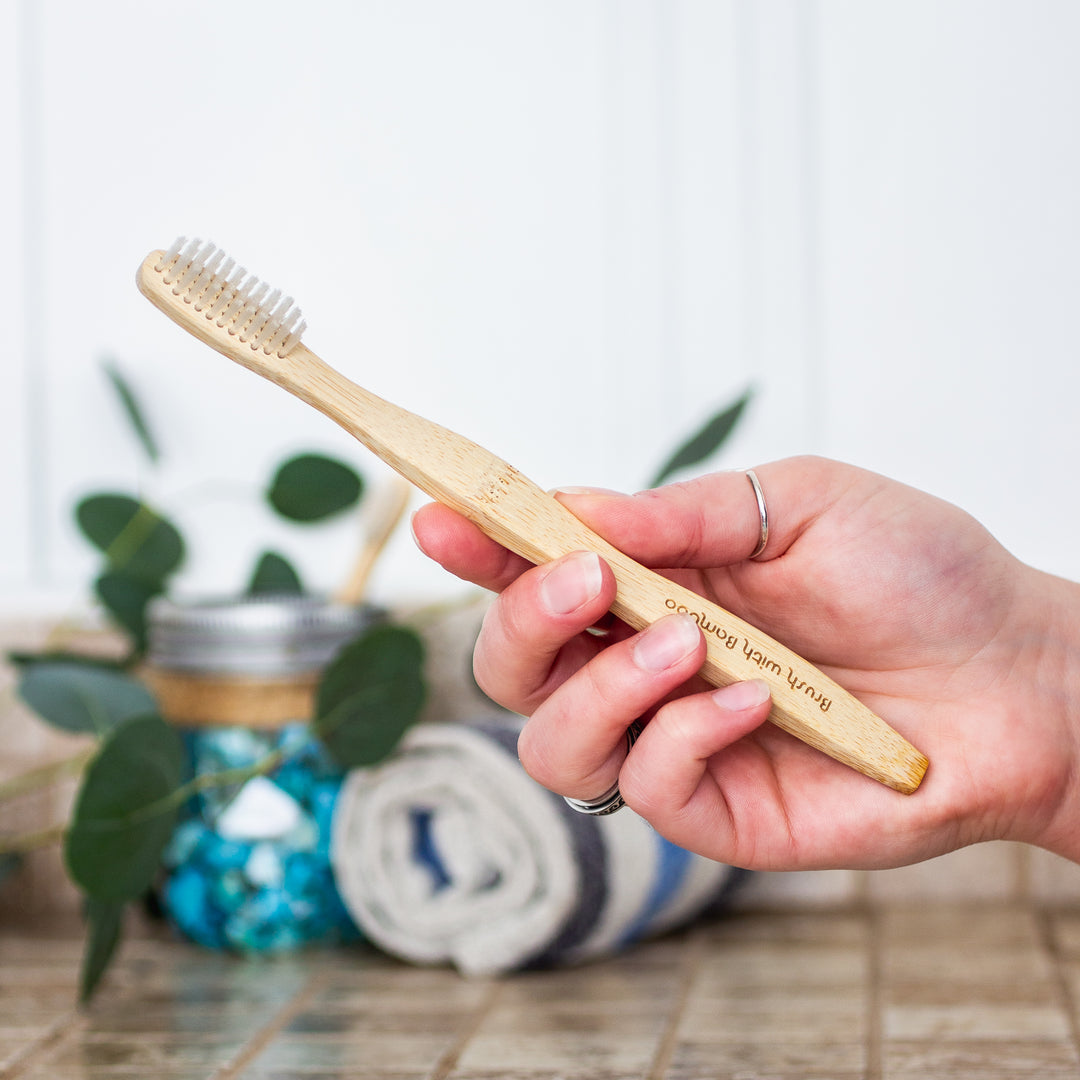 Brush with Bamboo Bamboo Toothbrush - Adult Size in Hand