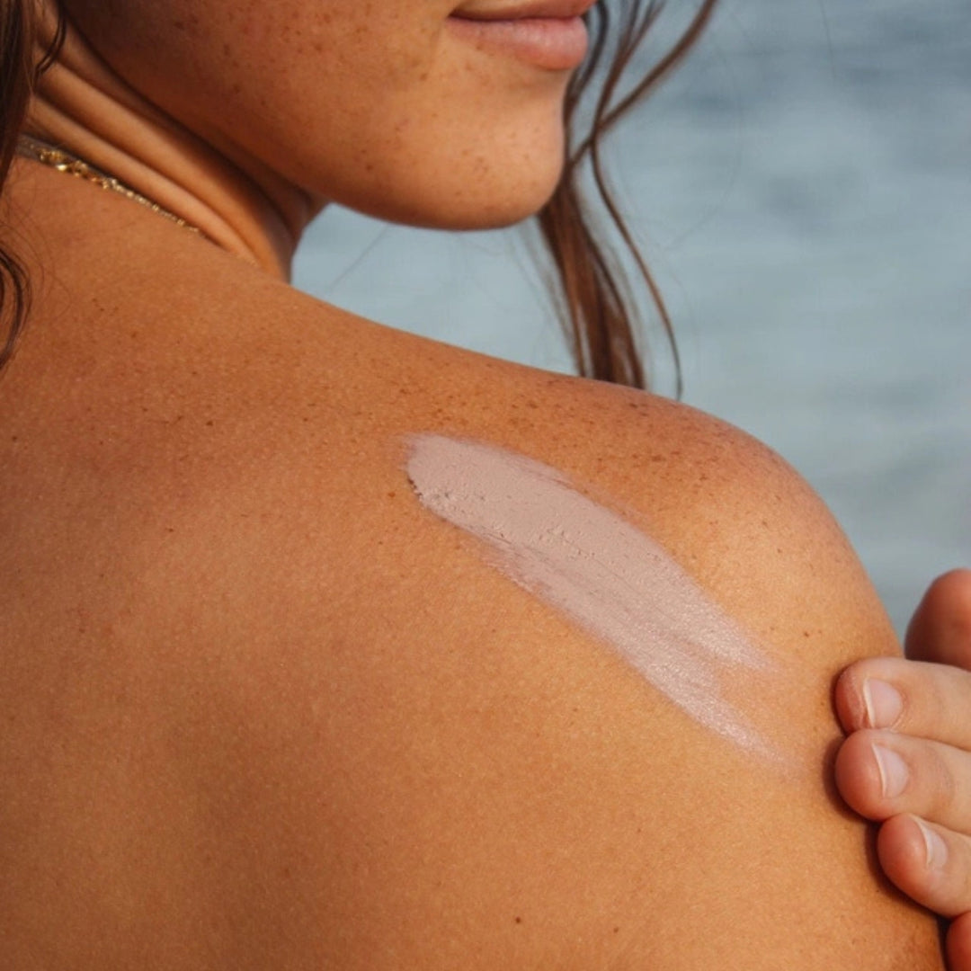 Reef Safe SPF 30 Tinted Sunscreen - Applied to Shoulder